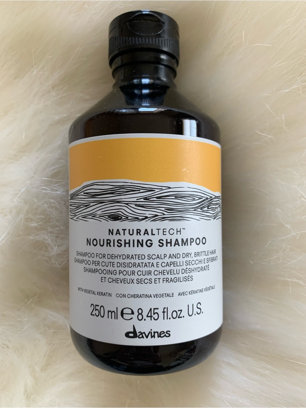 Davines Nourishing Shampoo Bottle - Yellow and Brown